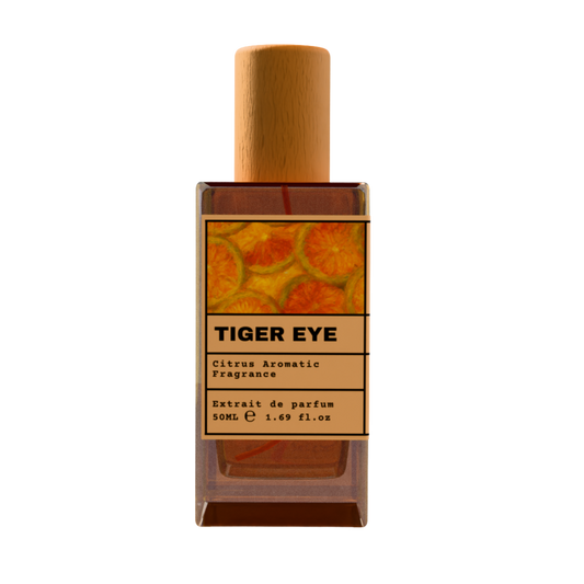 TIGER EYE Citrus Aromatic Fragrance luxury perfume bottle with orange fruit slices label design and wooden cap on a transparent background